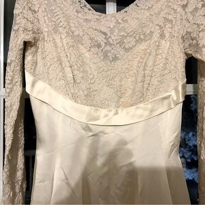 Vintage wedding dress from 1950’s
Lace bodice with full satin dress